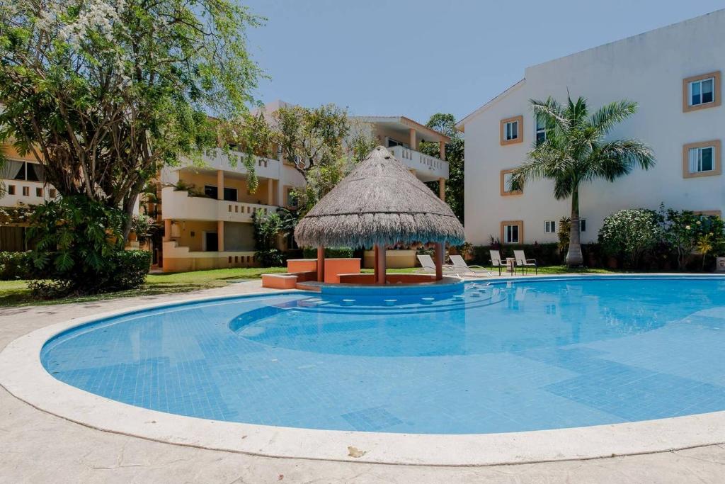 Private balcony I Gated Playacar I Pool On Site!