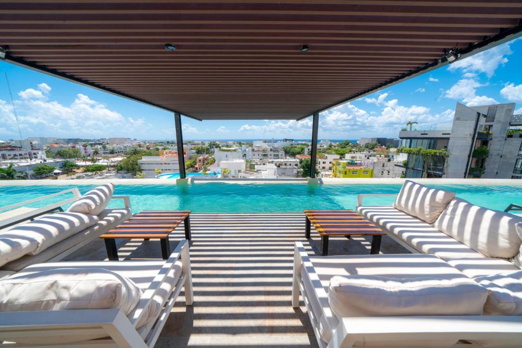 Rooftop with Ocean Views - 2 Bedrooms with Pool - At Arenis Condos 309