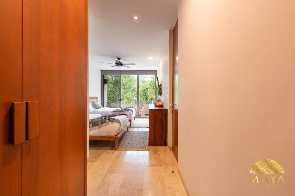 NHOA 208A Lux 2BR Condo Jungle View in Aldea Zama