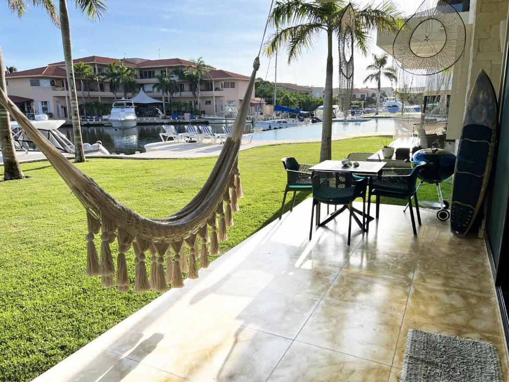 Ground Floor Paradise with Marina View and Pool Paddleboard Included