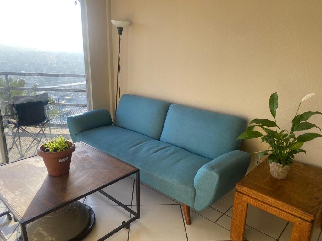 Habitación en departamento con vista a la ciudad