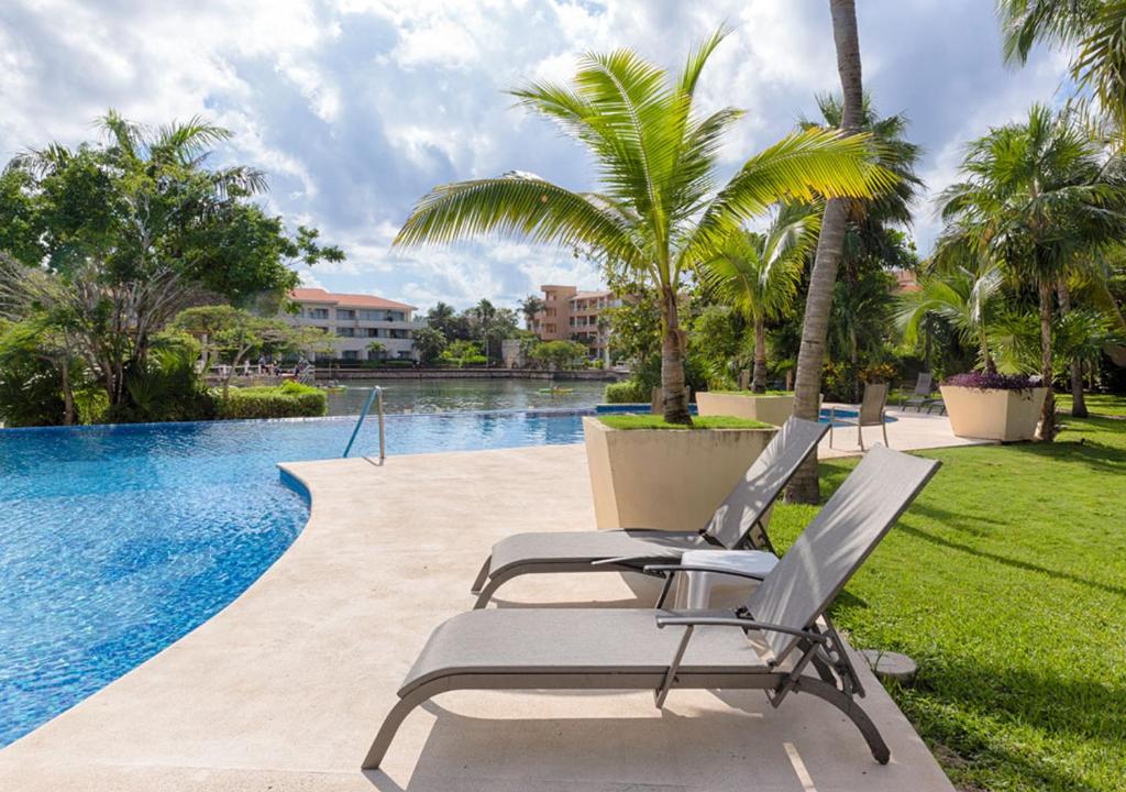 High-End Waterfront Condo at Secrets Waters