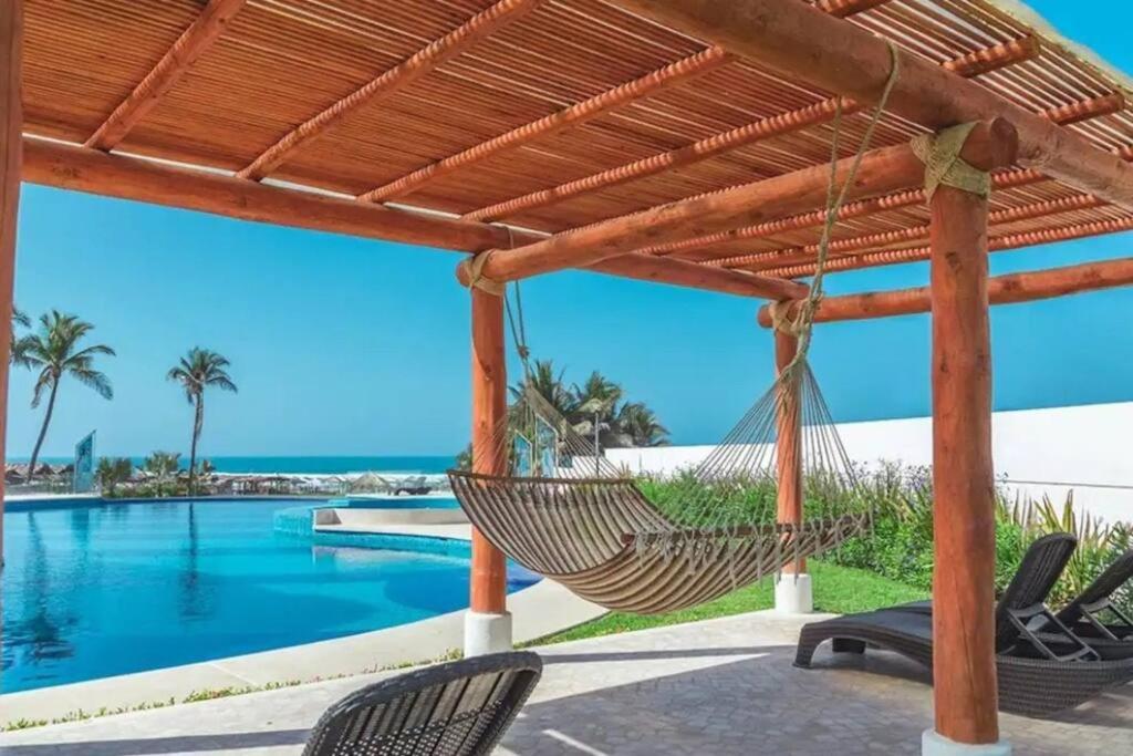 Increíble departamento Club de Playa canchas de pádel para 8 huéspedes