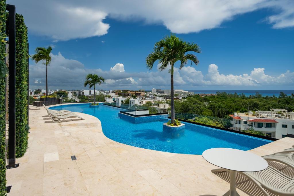 Menesse Liltowm rooftop con vista al mar