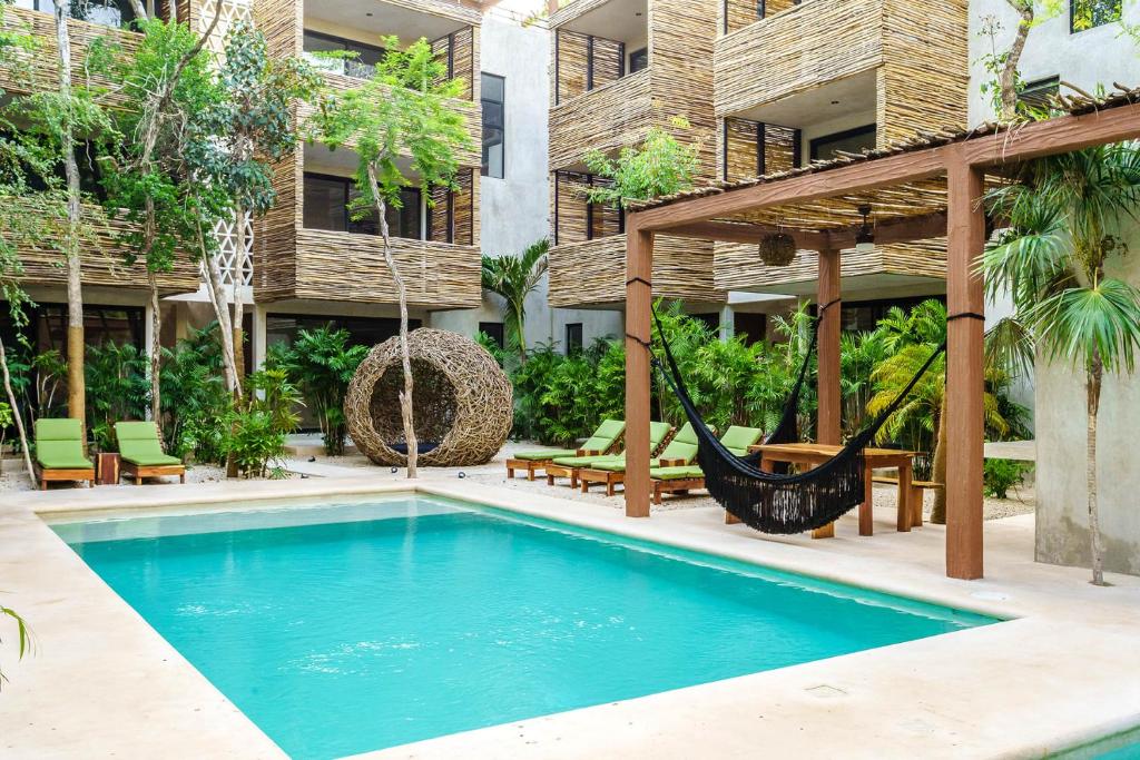 Eco-sustainable Luxury Between Beach Hotspots & Tulum Town by Stella Rentals